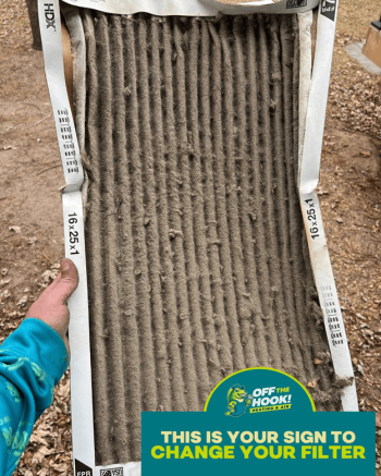 Off The Hook Heating & Air employee holding dirty air filter from Princeton furnace maintenance call
